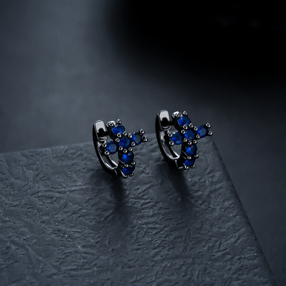 X1077-D (blue zirconium cross earrings) gun black pair