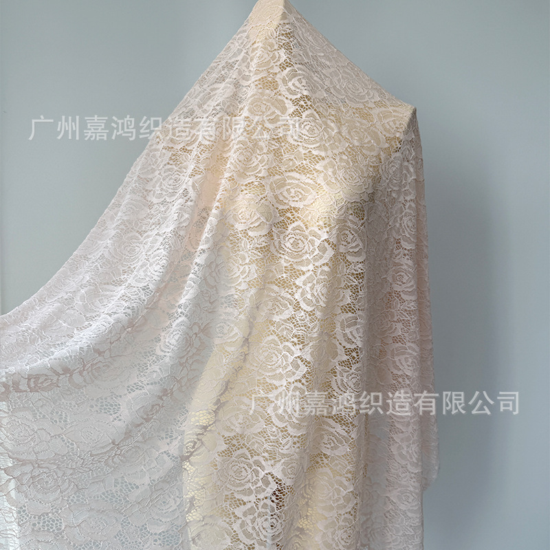 Tejido de encaje elástico de poliamonio 2026 tela de ropa de mujer para hacer falda, vestido, blusa, tela