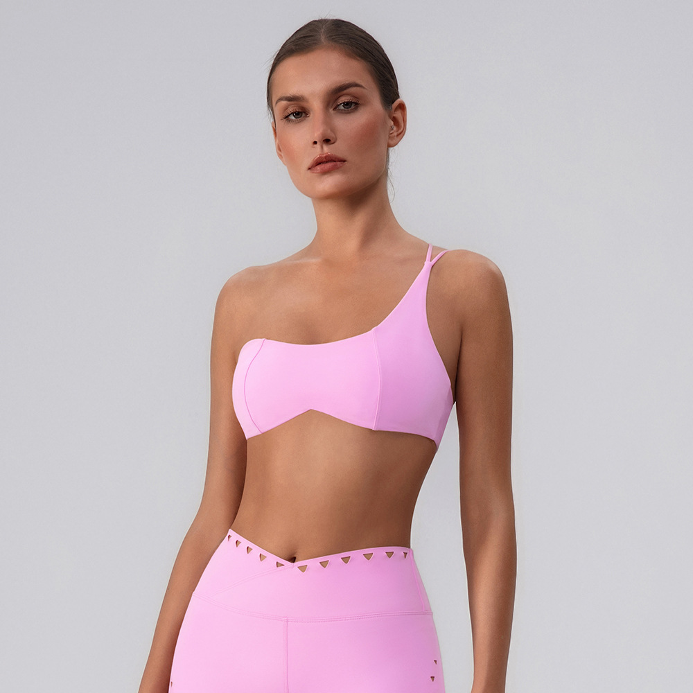 Sujetador de yoga hueco europeo y americano, almohadilla para el pecho desmontable de secado rápido, ropa interior deportiva, ropa de fitness Pilates, top de un hombro para mujer