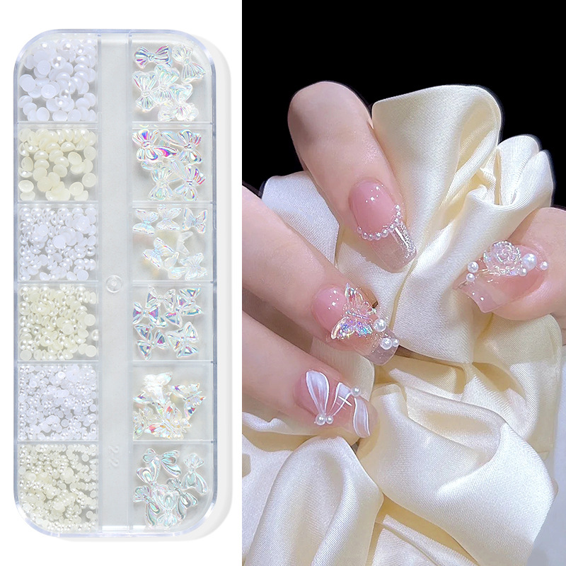 Joyería de uñas Aurora arco perla remache pequeños accesorios Super Flash pequeño diamante 12 rejilla mixta decoración de uñas al por mayor