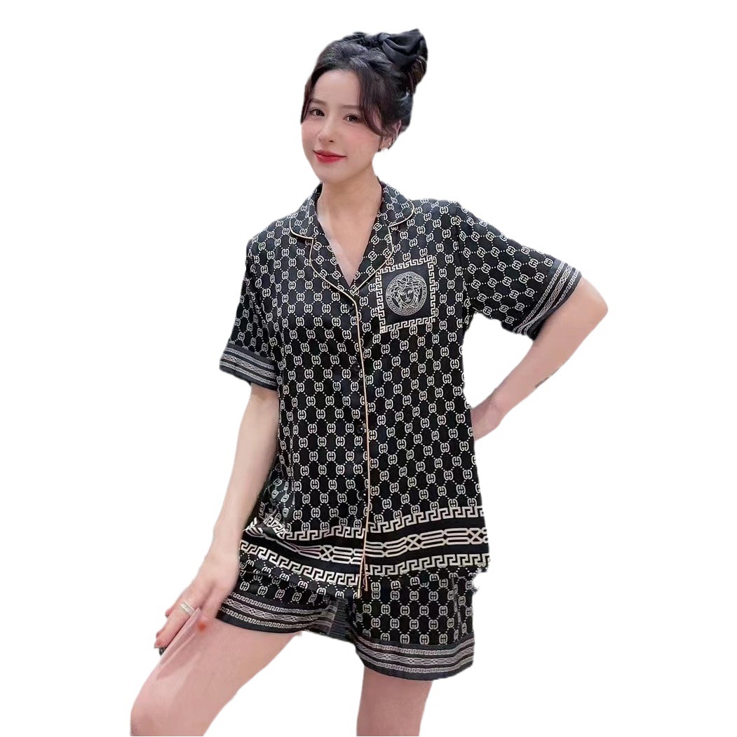 Pijamas de pareja pantalones cortos de manga corta de seda de hielo de verano traje de estilo de marca grande de dos piezas delgadas para hombres y mujeres ropa para el hogar