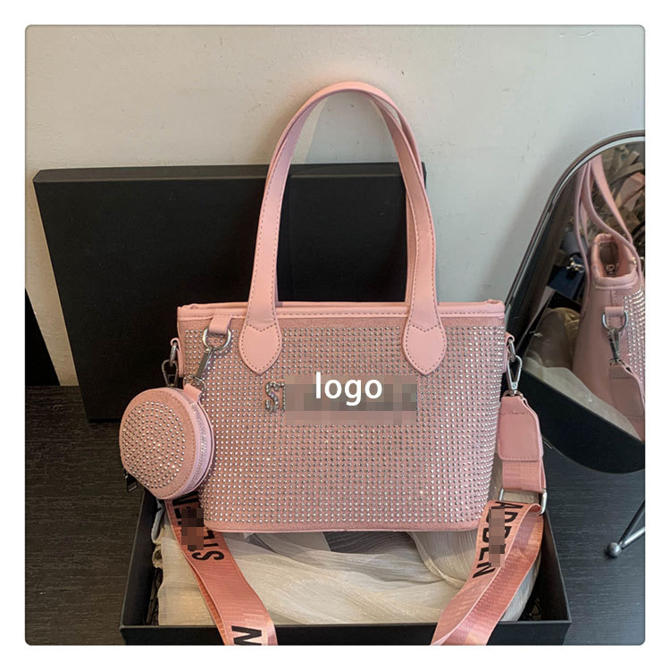 Bolso de letras de diamantes de imitación transfronterizos diseño de nicho femenino moda simple portátil popular 2025 nueva textura bolsa de mensajero