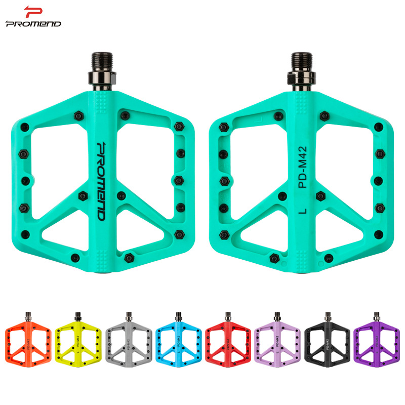 PROMEND 10-color mountain bike pedals with nylon DU bearings and a large pedal surface.