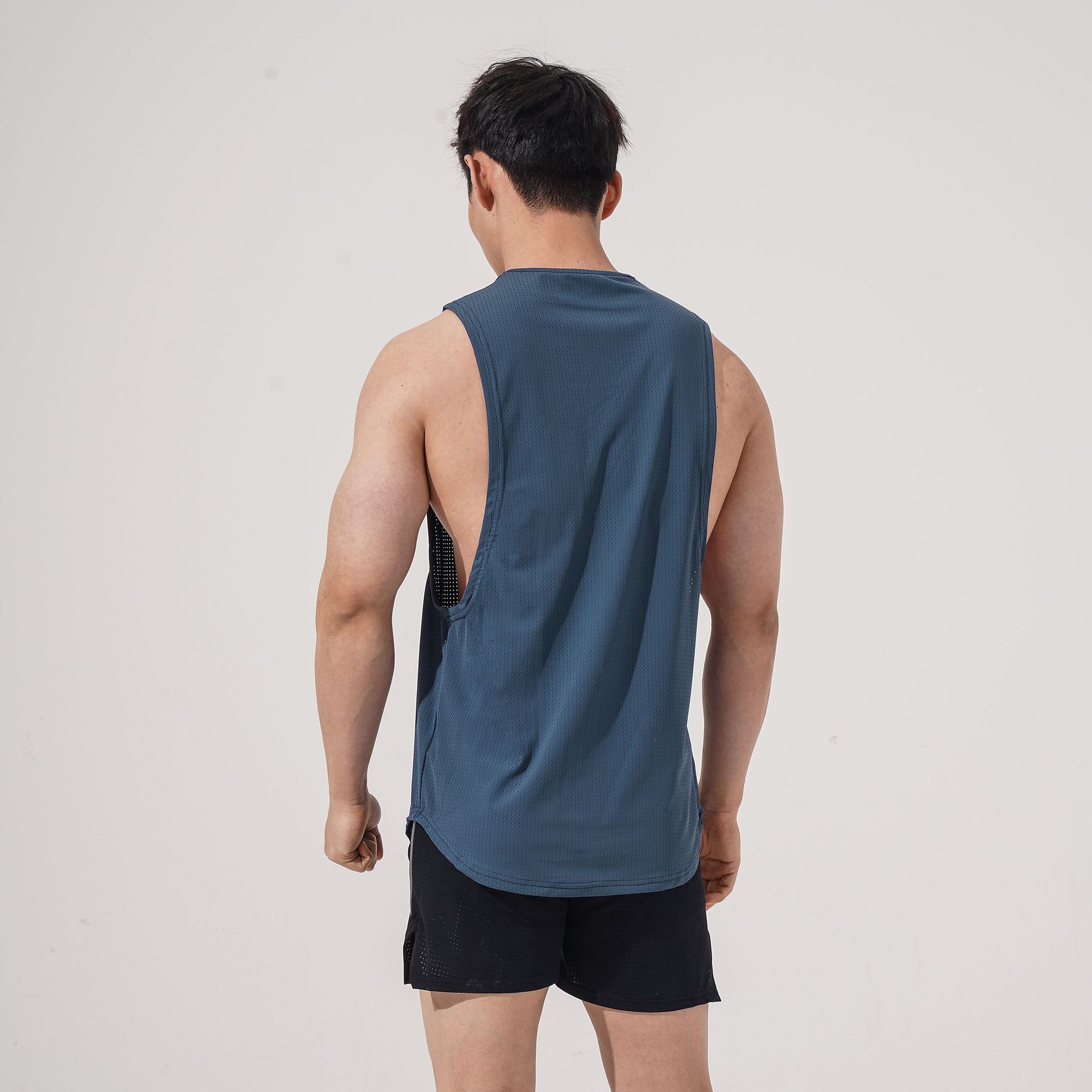 Chaleco transfronterizo de Europa y América malla de material de nylon de los hombres deportes gimnasio chaleco cuello redondo sin mangas en stock suministro