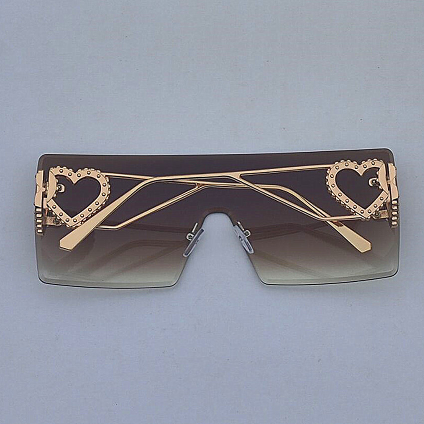 Occhiali da sole rotondi rétro da donna con montatura nera moda_voghion.com