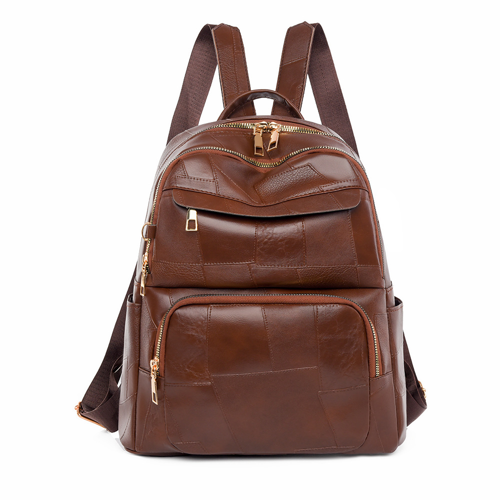 Mochila para mujer nueva moda todo-fósforo mochila de viaje bolso de viaje simple cuero suave mochila escolar de gran capacidad al por mayor