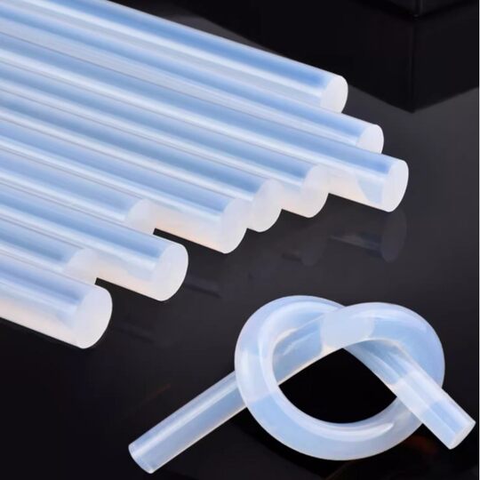 in stock wholesale transparent environmentally friendly hot melt adhesive high viscosity EVA hot melt adhesive strip 7mm 11mm non-drawing hot melt adhesive stick