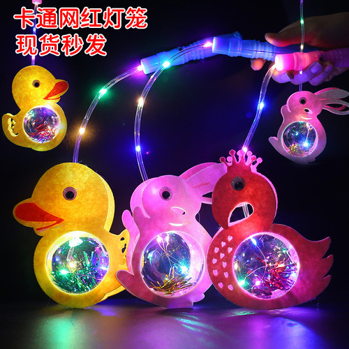 Wholesale flashing cartoon lantern pop balls rolling gift night market stall children's glowing toys
