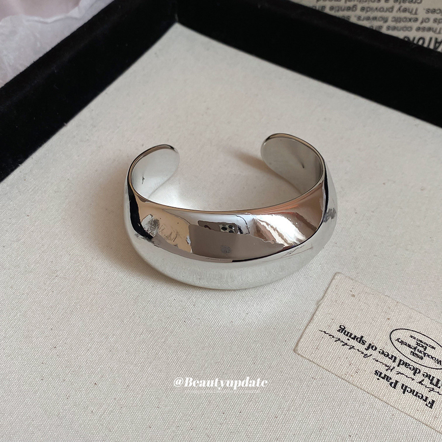 Pulsera abierta con torsión brillante geométrica irregular, pulsera de nicho de personalidad de estilo europeo y americano, joyería de temperamento exagerado al por mayor