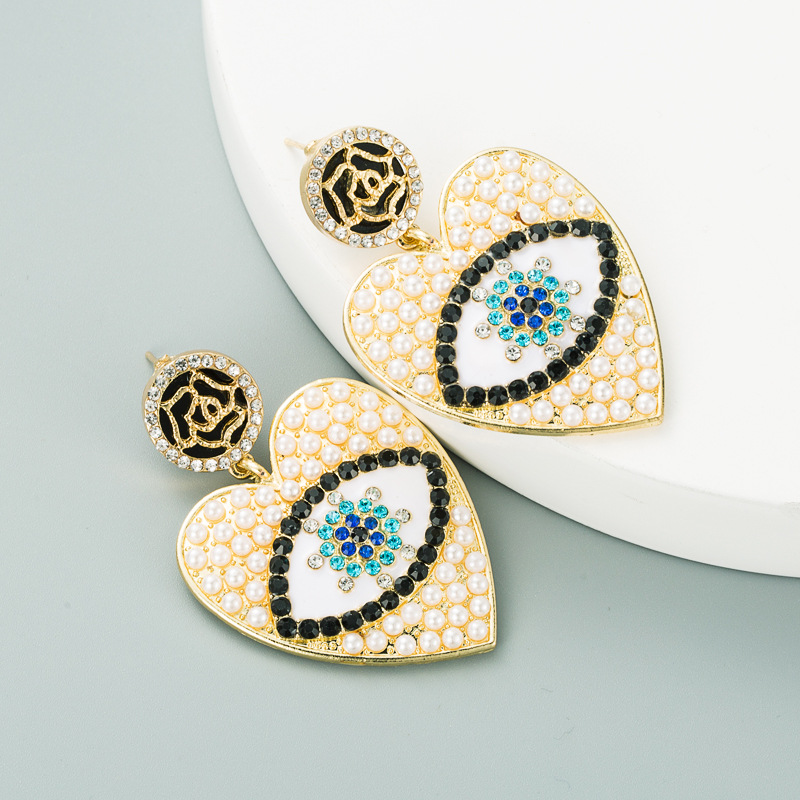 Devil's Eyes Alloy Diamond-studded Earrings display picture 6