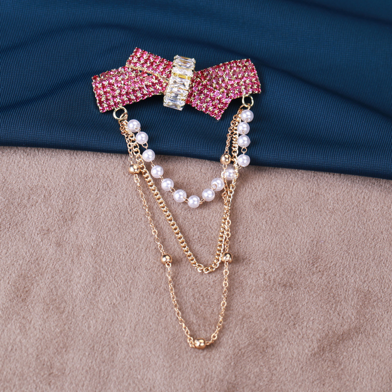 Elegant Glam Bow Knot Alloy Tassel Plating Inlay Artificial Pearls Rhinestones Women's Brooches display picture 3