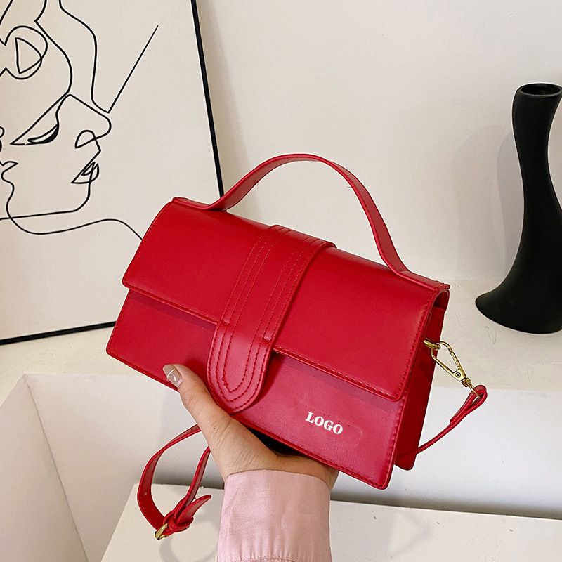 Bolso de diseño de nicho francés 2023 transfronterizo nueva bolsa de mensajero de hombro textura avanzada bolsa de palo francés bolsas