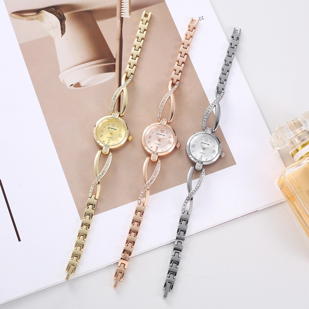 Comercio exterior nuevo reloj de lujo redondo de las mujeres multicolor Placa de tamaño pequeño temperamento de moda digital punto diamante Cruz reloj de pulsera