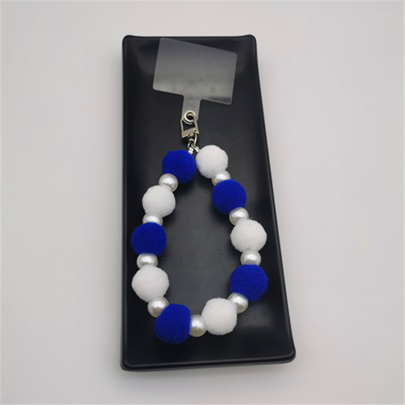 Nueva Bola de piel de cadena de perlas colgante Cadena de teléfono móvil ins Internet celebridad mismo estilo muñeca de invierno pulsera peluda cadena portátil