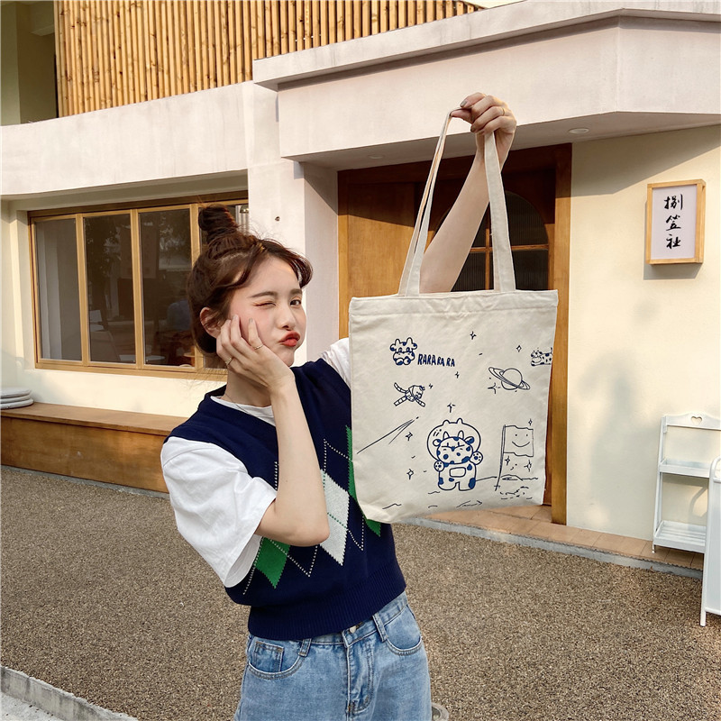 【 In Stock 】13173 Cute Moon Landing Cow single-shoulder Bag, student girls' schoolbag, canvas bag, large capacity wholesale undefined