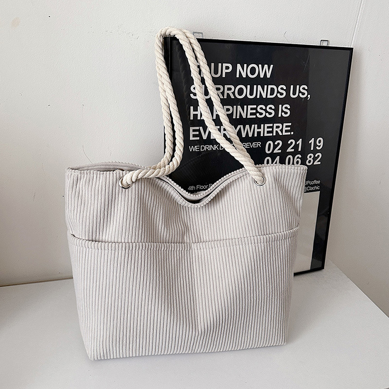 Otoño y invierno retro moda de gran capacidad de tela de cordillera 2024 nueva textura de bolso de hombro de mamá