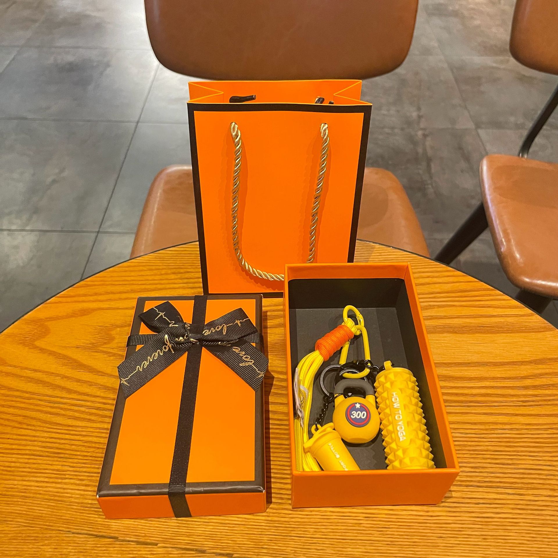 Yellow set for yoga from foam, orange gift box
