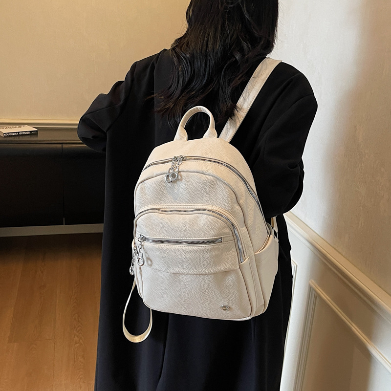韩版纯色百搭pu软皮双肩包女2025新款大容量旅行背包高中学生书包|undefined
