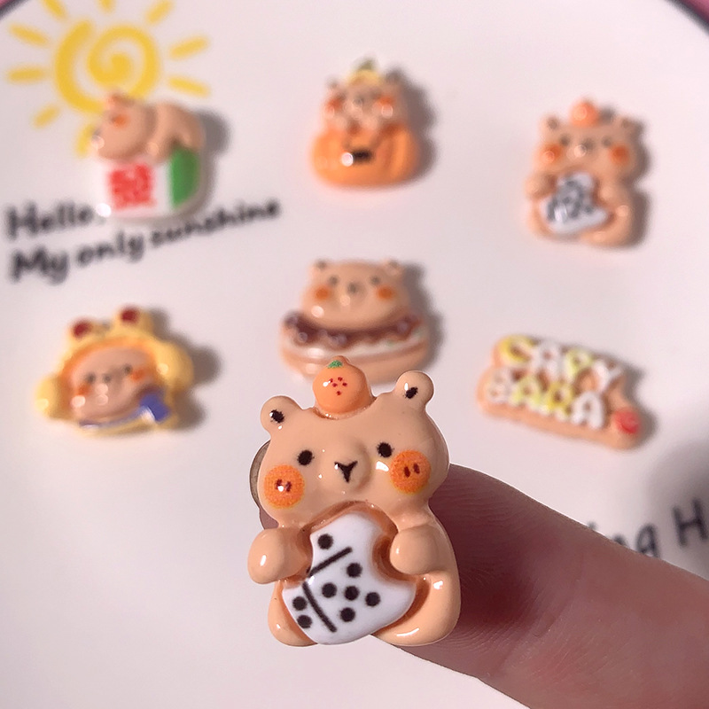 Caricatura brillante animal delfín oso de agua accesorios de resina DIY hechos a mano caja de teléfono móvil broche de cabello agujero de cuerda zapatos agujero decoración