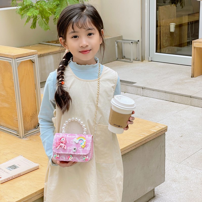 Bagos para niños 2025 nuevo estilo coreano de niña princesa bolso de cambio de mano lindo bolso de hombro de dibujos animados de peluche
