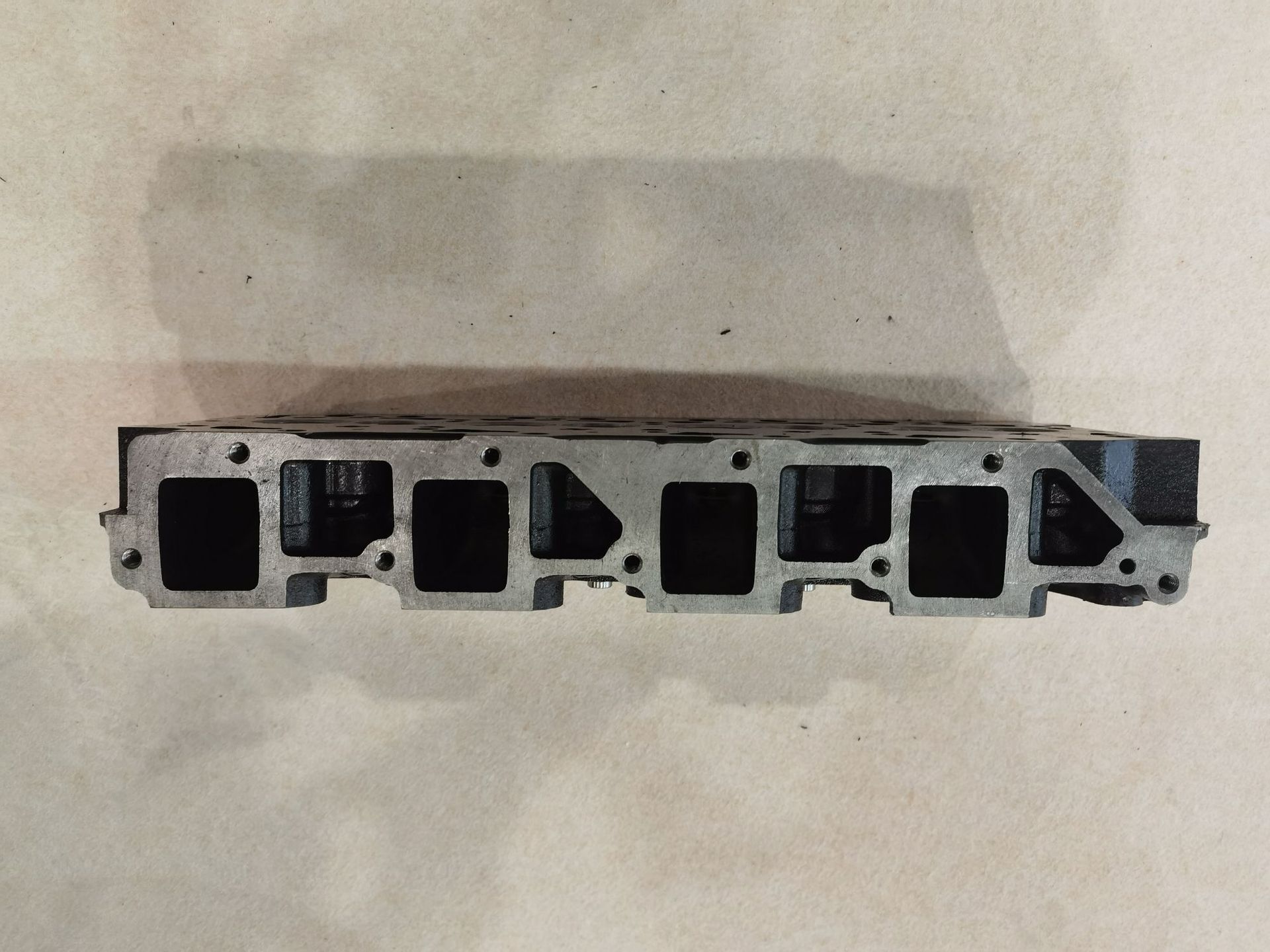 Factory Direct Diesel Engine Cylinder Head 4D94E Swirl Four Cylinder Cast Iron Cylinder Head 4D94E Forklift Applicable