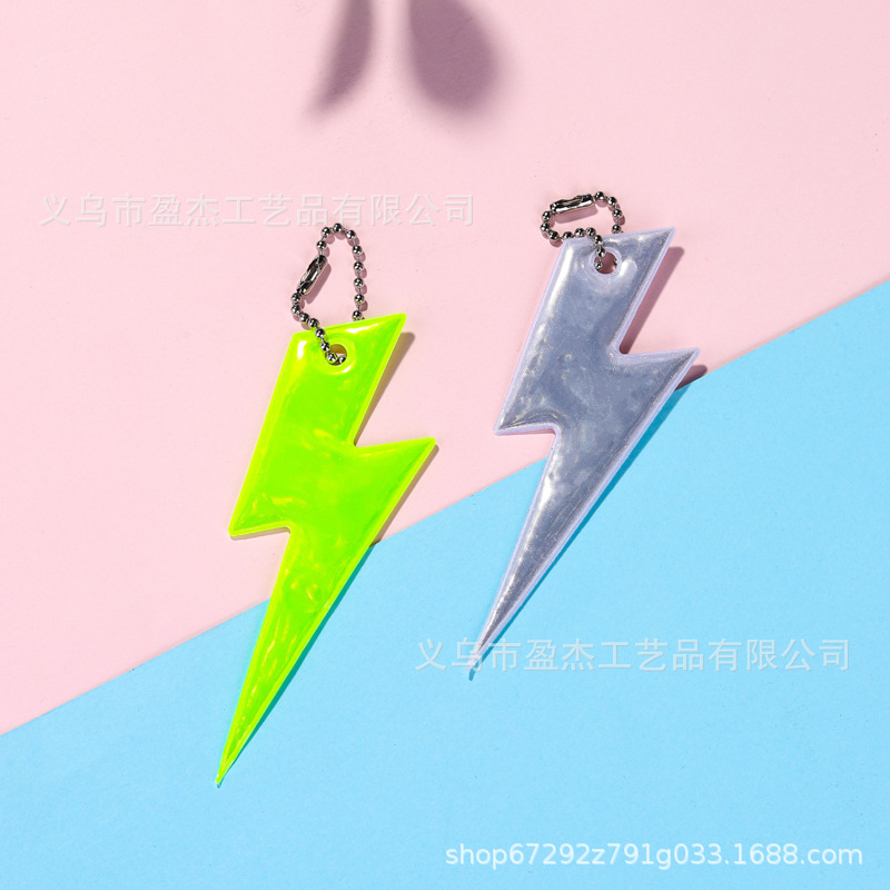 Colgante reflectante Gráficos de relámpago de doble cara Reflex Keychain PVC Night Riding Safety Advertency Colgante Mochila