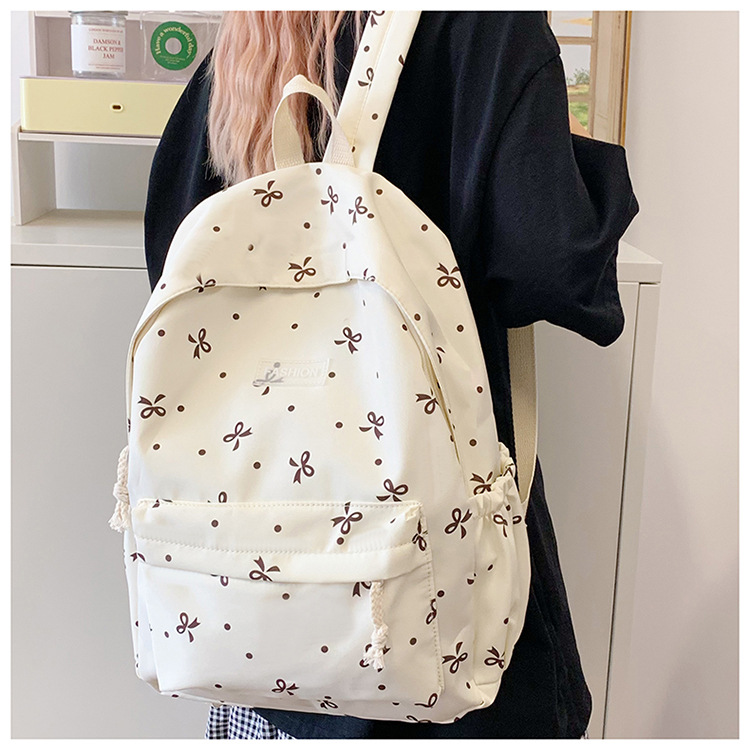 Japanese-style minimalist casual large-capacity backpack for middle and high school students, lightweight and trendy school daypack for girls