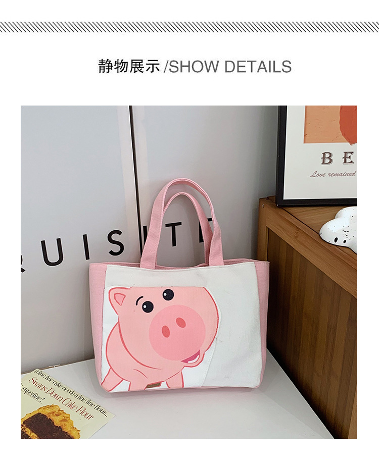 Cute cartoon printed small bag, 2024 summer new style hand-held piggy girl handbag, student storage canvas bag undefined