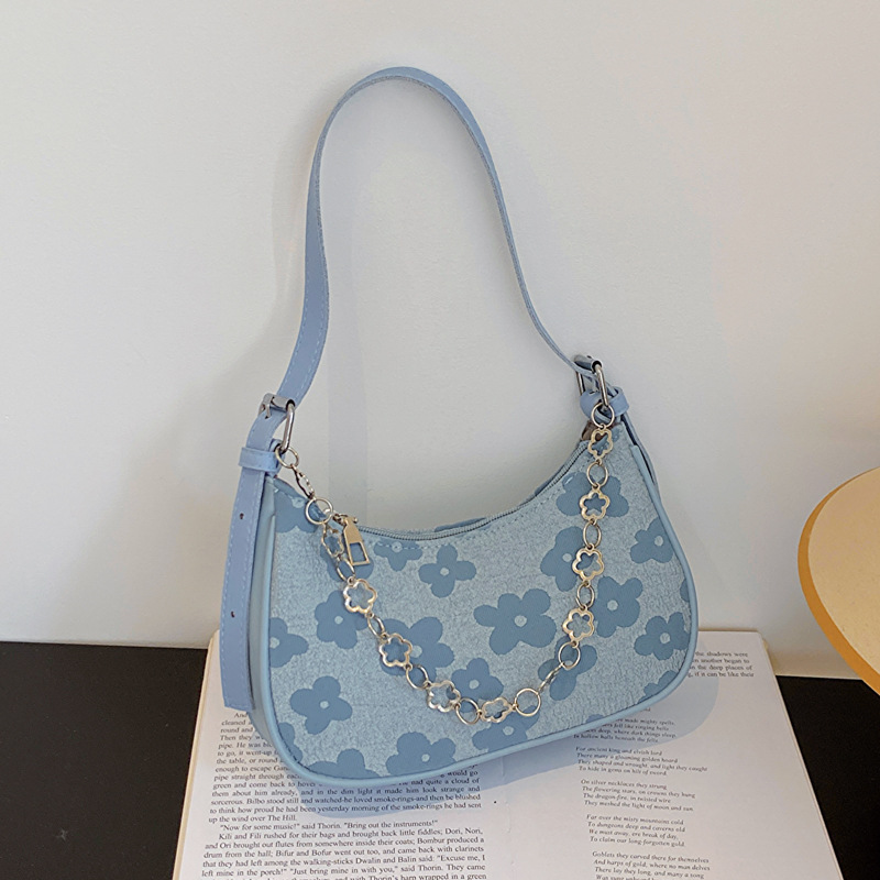 Bolso de las axilas para las mujeres 2023 nuevo bolso de mensajero de hombro de moda nicho retro ins baguette bolsa de tela tejida de encaje