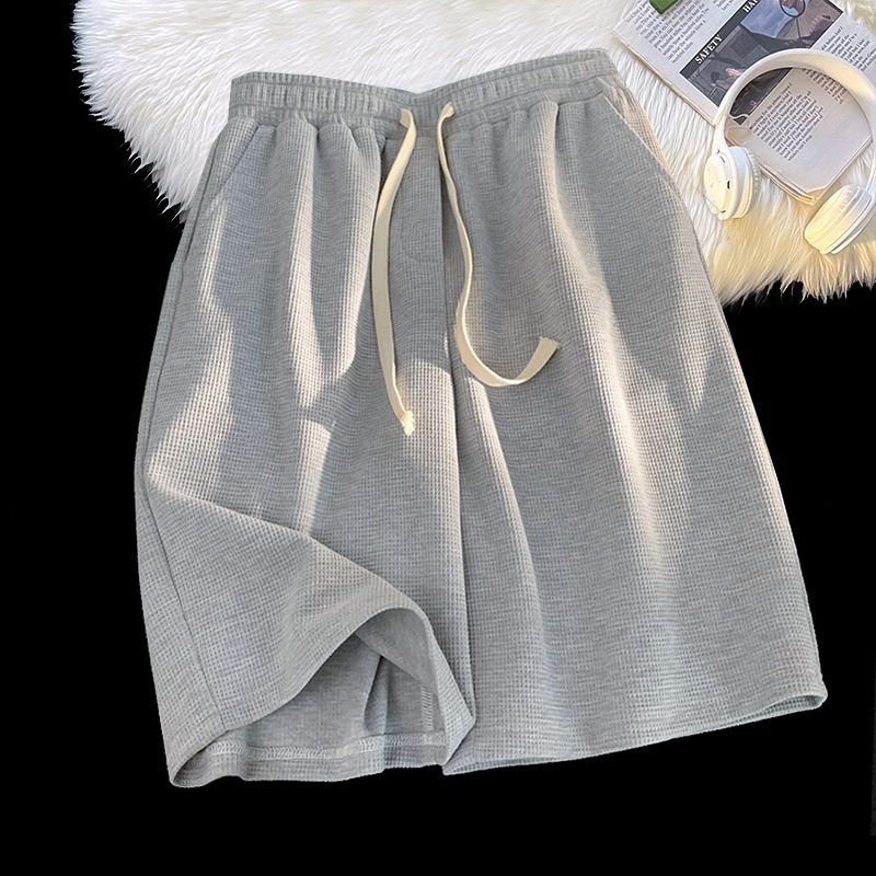 Directo de fábrica de verano de color sólido waffle shorts hombres de moda simple marca suelta quinta pantalones juventud Pantalones rectos