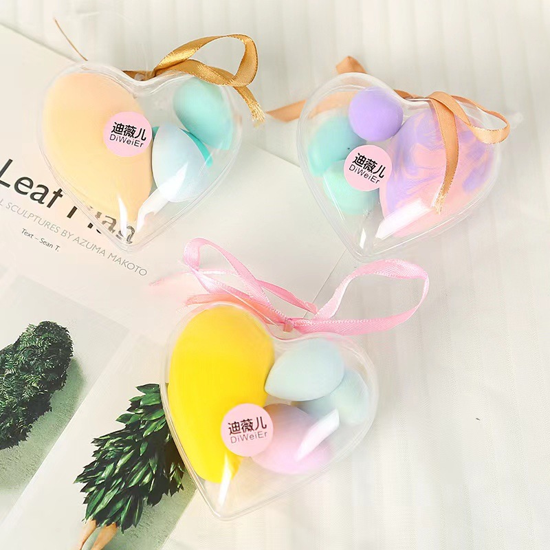 El amor de los huevos de maquillaje no comer polvo, polvo seco y húmedo, maquillaje con un pequeño conjunto de polvo de maquillaje de huevos de color al por mayor.