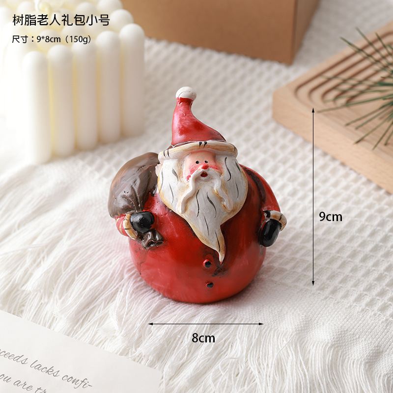 Buscando madera transfronteriza nueva decoración navideña resina muñeco de nieve decoración de escritorio retro micro paisaje diseño de props