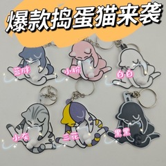 かわいいアイデアがいたずら猫のストラップをして回転できるアクリルのキーホルダーが学生の漫画のかばんに飾られている