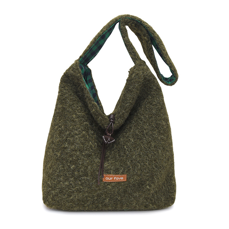 Otoño e invierno bolsas de lana mujeres 2025 nuevo estilo coreano bolsas de balde de peluche suave pegajosa estudiantes de clase de mochila de hombro de moda