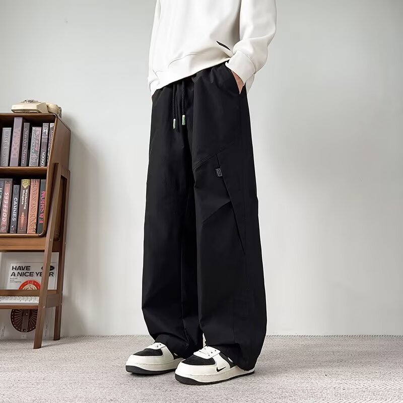 Hombres sueltos de tamaño grande comercio exterior primavera y otoño nuevos pantalones casuales de tamaño grande pantalones juveniles recto pantalones de piernas anchas transfronterizos