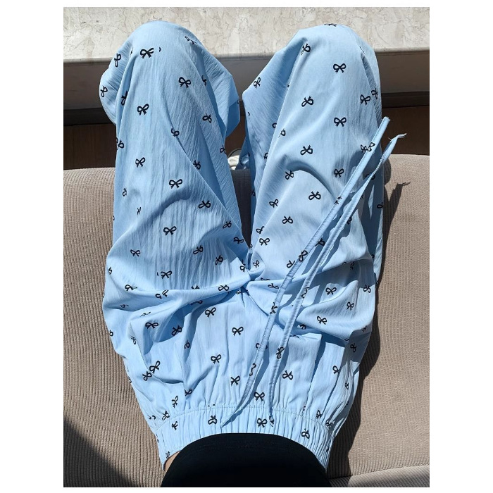 Cuatro estaciones pijamas primavera y otoño dulce delgamiento correa de impresión de arco de verano pantalones largos de invierno pantalones caseros se pueden usar al por mayor