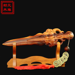 雷が鳴った桃の木のの剣の木製の工芸品のハンドルの部品の雷が木の宝剣を割って子供の寝室の家庭の置物をつるします。