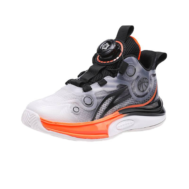 Zapatos de baloncesto permeables para niños 2025 primavera y verano nuevos zapatos infantiles botón giratorio zapatos de fútbol para niños zapatos antideslizantes para niñas