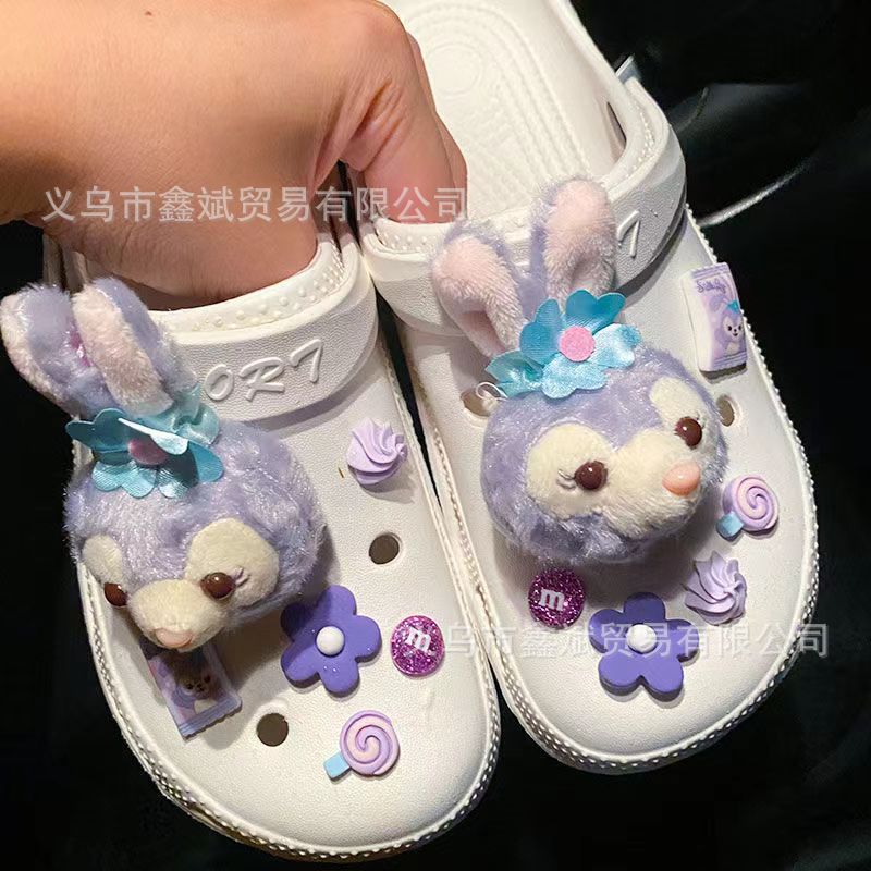Muñeca de dibujos animados felpa estrella Delu agujero zapatos accesorios piel bola creativa nuevos zapatos decorativos hebilla agujero zapatos Accesorios