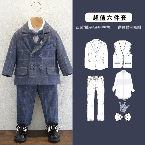 Suit, vest, trousers, shirt, bow tie, brooch