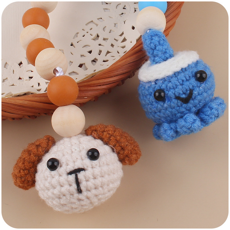 Suministros para bebés de dibujos animados animal cachorro colgante de punto de cuatro piezas de los niños de educación temprana Beech sonajero adornos de juguete