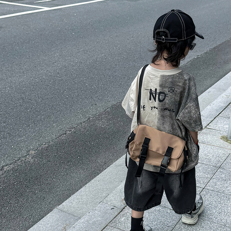 Bolso de hombro para niño simple japonés Bolso de mensajero para niños de color sólido retro 2024 verano nuevo bolso para niños de comercio exterior