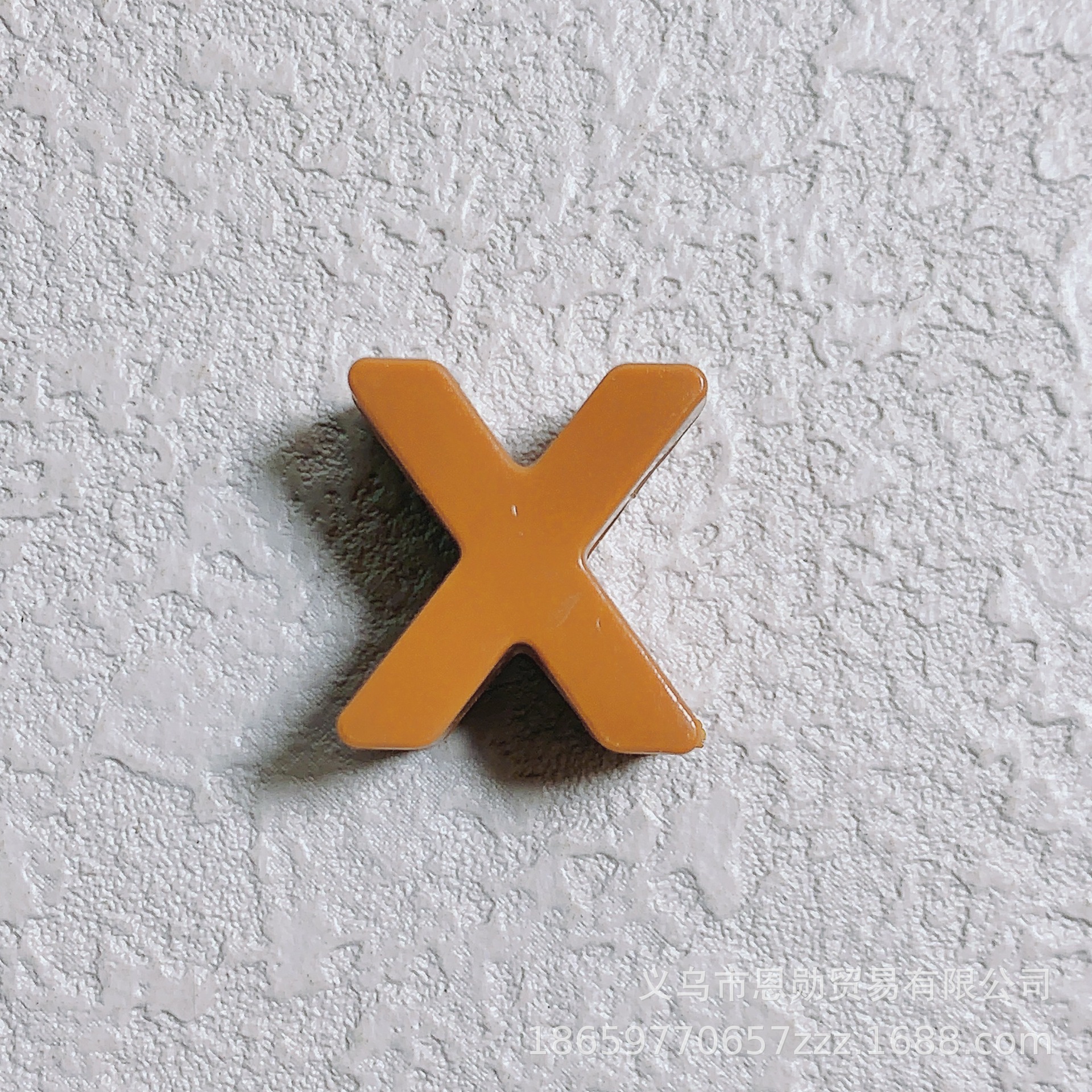 New style: X (brown)
