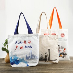 空白のキャンバスバッグカスタム卸売厚みのあるキャンバスバッグカスタム学生巾着コットントートバッグはロゴを印刷することができます