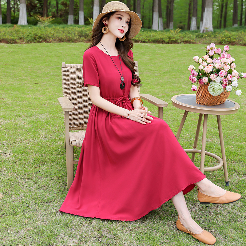 お母さんの端正な大気の夏服の新型の純色の綿のワンピースの中の長い高級な気質は腰を収めてやせているスカートを現します。|undefined