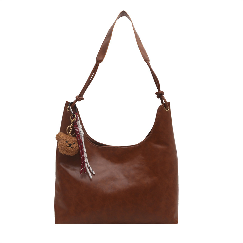 Bolso de brazo retro para mujeres 2025 primavera nueva moda hollow coreana bolso especial de gran capacidad empalmado bolso de hombro