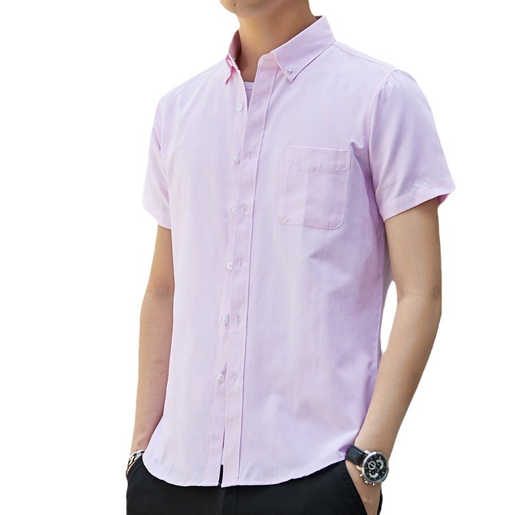 Camisa de manga corta versátil de tela Oxford para hombre, primavera y verano, con un toque de alta gama, estilo coreano, ajustada, para negocios y desplazamientos, resistente a las arrugas.