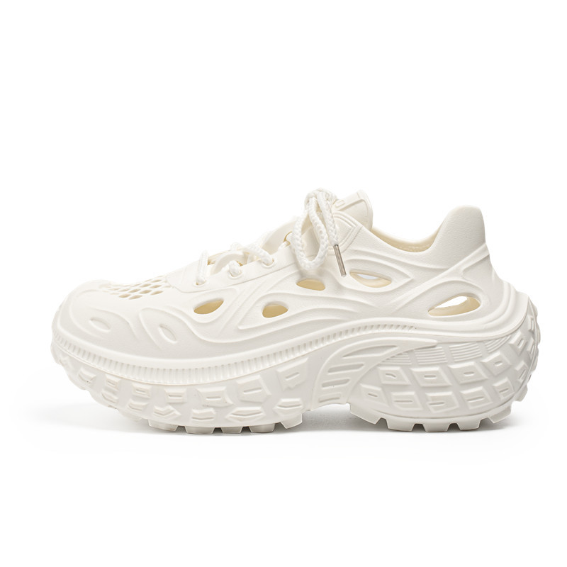 Diseñador de zapatos de coco de lujo ligero 2025 Xia Kanye Pareja al aire libre playa zapatos con agujeros Douyin video sandalias hombre