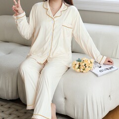 太った妹は200斤のカーディガン長袖パジャマ秋の坑条牛乳糸に太って太った人は300斤の家で服を着ている