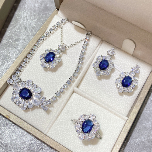 Versa jewelry fashion set gold-plated imitation tanzanite sapphire pendant 10*12 earrings live ring set of four